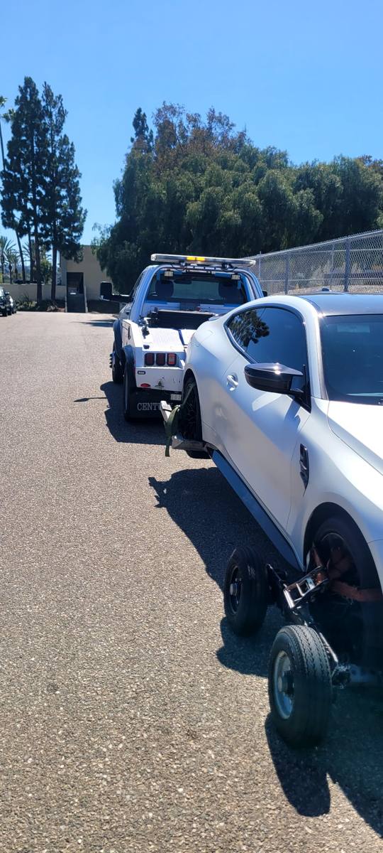 Los Angeles Towing hauling a car
